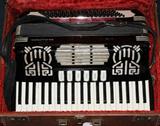 LOT # 2224, MAJOR ACCORDION CO. BLACK AND WHITE PIANO KEY ACCORDION
