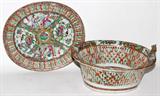 LOT#63  CHINESE ROSE MEDALLION CHESTNUT BOWL & UNDER PLATE, 19TH C, 2 PCS., H 5 1/2", W 9", L 10", having pierced designs on the sides of the bowl and rim of the under plate; interior scenes, birds and flowers; fired gold ears/handles on the ends of the bowl.