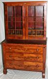 LOT#123  AMERICAN EMPIRE MAHOGANY SECRETARY DESK, 19TH CENTURY, H 71", L 41", D 20", Having upper glass paneled doors, flip top, and 3 drawers on scroll feet.
