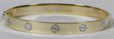 LOT#143  14KT GOLD LOVE BRACELET, White & yellow gold.  19.4 grams.  With key.