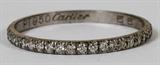 LOT#146  CARTIER .75CT DIAMOND & PLATINUM ETERNITY BAND, SIZE 7 1/4, F-color, Fs-2 clarity.  1.2 grams.
