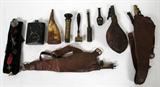 LOT#227  CIVIL WAR AND POST WAR POWDER TIN, LEATHER POWDER FLASKS, MEASURERS, ETC. C1865, 12 PCS., includes two leather powder flasks with measurers, assorted tools including wad cutter, shotgun powder measure and one black powder tin inscribed Xenia Powder Co.