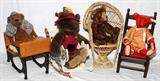 LOT#236  JANET REEVES, LINDA SPIEGEL, STEIFF AND GUND TEDDY BEARS AND CHAIRS, 8 PCS., includes one Janet Reeves Brown bear, 10" H. having a collar with bells, seated in a miniature high back split bamboo and cane doll chair, 17" H.; one Linda Spiegel 'Sherlock Holmes' brown teddy bear, with cape, hat and smoking pipe, 13" H., sitting in a wrought iron and wood school desk, 9" H. x 11" L. x 8" W., Steiff red fur bear, with orange color shirt with matching shorts, 13" L. sitting on a miniature wood ladder back chair, with spindle frame, legs. Red cushion seat., 15" H. x 8" W.; and one Gund brown teddy bear with hounds tooth costume, hat with flowers, 15" H. sitting on a wood cat form rocker, 10" H. x 13" L. x 7" W.