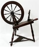 LOT#391  AMERICAN PINE SPINNING WHEEL, H 32", L 33", having turned spindle tripod base and stretchers.