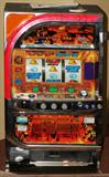 LOT#393  JAPANESE PACHILSO SKIL-STOP' SLOT MACHINE LATE 20TH C, H 32", W 19", D 15", Japanese slot machine inscribed: "777", "The Survival World", "15 + Big Change". Having coin slot and digital readouts on the front. Push bet buttons, spin stop buttons and start ball form lever. Uses gilt tokens.