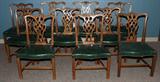 LOT#1036  CHINESE CHIPPENDALE STYLE MAHOGANY DINING CHAIRS, SET OF TEN, Set of  ten includes 2 arm chairs and 8 side chairs. Green leather upholstered seats with brass nail heads.