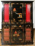 LOT#1260  CHINOISERIE DESIGNED CHINA CABINET, H 74", L 53 1/2", D 15", top portion consists of two glass paneled doors flanking a wood paneled center cabinet door all above three drawers; two cabinet doors with gilt wire faces flank a center wood painted cabinet door; having painted landscape scenes and red painted interiors. Brass pulls and handles;
