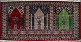LOT#1491  PAKISTANI PRAYER RUG, 3' 2" X 5' 11", Featuring three prayer niches on a red ground, within multiple borders.