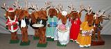 LOT#2151  MECHANICAL REINDEER, 8, H 46" TO 57", Electric; composition bodies. Provenance: a Pennsylvania department store.