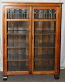 LOT#2158  MISSION OAK BOOKCASE, C. 1880-1900, H 57", W 42", D 14", Two glazed doors with leaded glass at the top of each.
