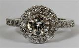 LOT#2165  1.00CT DIAMOND HALO RING & 1.00 SIDE DIAMOND, SIZE 6, Center stone, J-color, Si-1 clarity.  Side diamonds, H-color, Vs-2 clarity.  14kt white gold.  5.1 grams.
