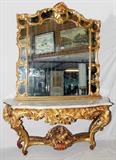 LOT#2191  CONTINENTAL FRENCH STYLE CONSOLE AND MIRROR, The console is H 36, L 72, D 24" while the mirror is H 67, L 62 each featuring gilt wood with leaf and shell designs.
