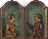 LOT#2284  DUTCH COLORED WAX MINIATURE PORTRAITS, 2, 18TH C., C. 4 3/8" X 2  1/2" & 4 3/8" X 2 7/8", Male & female; probably c. 1850; arched shadowbox frames.
