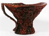 LOT#2400  CHINESE CARVED HORN LIBATION CUP, H 4", L 6", Carved with figural tree and flower motif.