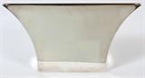 Lot# 8 LINO SABATTINI SILVER PLATE 'PERSEPOLI' VASE, H 10", W 20", D 4", Sabattini signed silver plate 'Persopoli' vase. Having a flared body opening up to the larger rim. Smaller rectangular base; Stamped 'Sabattini Italy' on underside;