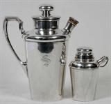Lot# 15 STERLING COCKTAIL SHAKERS, TWO, H 5" & 10", Large shaker monogrammed "S" and marked sterling. Small shaker marked Reed & Barton.