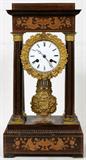 Lot# 36 FRENCH ROSEWOOD & MARQUETRY PILLAR MANTEL CLOCK, 19TH C., H 18", W 9", D 5", Featuring French design inlays of urns and flowers across top with moldings around the four sides; four columns with bronze capitols and bases; white enamel face with Roman numerals, two key wind and bronze bezel with fired gold accents. Bronze medallion leaf form adjustable pendulum. Complete dimensions are H 18 1/4", L 9 3/8", D 5 1/2". Similar inlay designs on footed base;