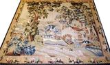 Lot# 47 EUROPEAN WOOL TAPESTRY, 20TH C, 6' 1" X 5' 2", having a single wide border with flowers surrounding a scene of a stream, grist mill with waterwheel.