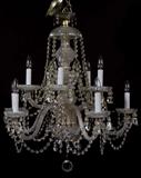 Lot# 65 TEN-LIGHT CRYSTAL CHANDELIER, H 24", DIA 24", having rope scroll crystal arms and swags.