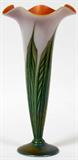Lot# 91 ART GLASS TRUMPET VASE, H 12", having a trumpet form contoured rim in iridescent pink with round tapered leaf design body narrowing to a iridescent round green base.