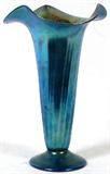 Lot# 95 ART GLASS HAND BLOWN BLUE IRIDESCENT VASE, H 11", having a flared and contoured rim, trumpet form body in blue to gilt iridescent color, ending in a round base; unique clover mark on the underside.