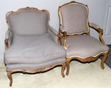Lot# 113 FRENCH STYLE WALNUT PARLOR CHAIRS, 2 PCS., having a soft gray upholstery. One being an arm chair with carved walnut flower design frame also one upholstered side chair with carved frame. Both having 'Interior Crafts Chicago' labels. Appears to be newer upholstery.