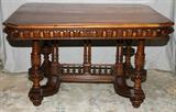 Lot# 148 ANTIQUE AESTHETIC REVIVAL, MAHOGANY DINING TABLE, H 28", L 40", D 49", various leaf, oval & etched designs surround table sides and stretcher. Spindles span stretcher; Spindle legs, bun feet Two leaves @ 15" each.