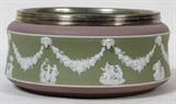 Lot# 251 WEDGWOOD LILAC & GREEN JASPERWARE BOWL, H 4", DIA 9", having a silver bezel at rim, lavender and green sides, with bunting designs and classical figures.