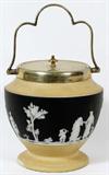 Lot# 258 WEDGWOOD JASPERWARE BISCUIT JAR, #196, H 6", DIA 5", having black basalt and light yellow on the sides, silver plate rim and wire handle;