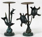 Lot# 341 PAIR BRONZE CANDLESTICKS SEA TURTLES & DOLPHINS IN RELIEF & FREE FORM, H 9", two bronze free form candlesticks depicting sea turtles and dolphins. Height 9". Round green marble bases.