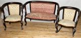 Lot# 346 MAHOGANY PARLOR SUITE, THREE PIECES, All pieces are H 34" and including a loveseat 48" W., with casters , arm chair 26" W. and a rocking chair 27" W., each with lion forms on the arms and brass upholstery nail trim.
