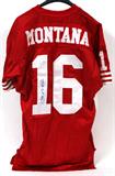 Lot# 380 JOE MONTANA AUTOGRAPHED SAN FRANCISCO 49'ERS JERSEY, a Wilson 'Prestige Teams' Forty Niner's red home jersey with "Montana' on the back in white block letters and signed by Joe Montana on the numeral '1' on the player number 16 on the back of the jersey. Includes a certificate of authenticity by Gallen Sports Productions, New York, New York.