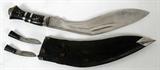 Lot# 441 TRADITIONAL KUKRI KNIFE 20TH C., 3 PCS., L 12" BLADE, traditional Nepalese Kukri knife with polished steel blade, horn handle with lion's head pommel; includes the small utility knives 'Chakmak' used for honing the Kukri and starting a fire with flint; and the 'Karda' used for cutting etc.; also a military leather covered wood sheath; Originally from the collection of nationally renown bladed weapons collector Dr. Leo Stanley Figiel.