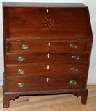 Lot# 1019 NEW ENGLAND MAHOGANY SLANT-FRONT DESK, 19TH C., H 42", W 35", Slant front hinges opens to envelope slots and drawers, fitted with four drawers having ivory key escutcheons, raised on bracket feet. Measures H.42" x 35" x 18 1/2".