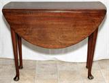Lot# 1025 QUEEN ANNE WALNUT DROP-LEAF TABLE, H 28", W 11 1/2", L 36", Rectangular top flanked by round drop leaves, each measures 13 1/2" wide, opens to approximately 38". From the Estate of Walter Connolly, Grosse Pointe Farms, Mi.