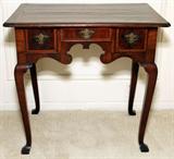 Lot# 1027 QUEEN ANNE INLAID WALNUT & MAHOGANY LOWBOY, 18TH C., H 28", W 30", D 21", Rectangular top with chamfered corners and beveled edge above three drawers and a scalloped apron, raised on cabriole legs. From the Estate of Walter Connolly, Grosse Pointe Farms, Mi.