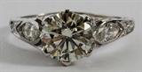 Lot# 1030 14KT WHITE GOLD & 1.53CT ROUND DIAMOND RING, Vs-2 clarity, K color. Weight of side diamonds, .50ct. Vs-2 clarity. 2.9 grams. Size 5 1/2.