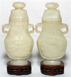 Lot# 1068 CHINESE CARVED HARD STONE URNS, PAIR, H 5 1/2", Loose covers. On teakwood stands. From the Collection of John P. O'Hara, Bloomfield Hills, Mich.