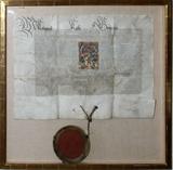 Lot# 1083 AUSTRIAN ILLUMINATED DOCUMENT PERTAINING TO FERDINAND I, HOLY ROMAN EMPEROR, 1561, FRAMED, Illuminated vellum measures approximately 19" x 26", with red wax seal, under glass in a contemporary frame, overall size 31" x 32 1/2".