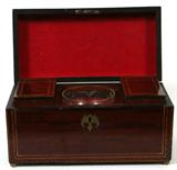 Lot# 1103 ENGLISH INLAID MAHOGANY TEA CADDY, 19TH C., H 6", W 12", Rectangular form with inlaid satinwood Greek key and brass banding overall, the hinged cover is centered by a handle and opens to two hinged compartments and a center well fitted with a glass jar, raised on four brass ball feet. Measures H.6" x 12" x 6". From the Estate of Walter Connolly, Grosse Pointe Farms, Mi.
