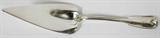 Lot# 1122 TIFFANY & CO. 'PALM' STERLING PASTRY SERVER, LATE 19TH C., L 11 1/4", Sterling silver pastry server with embossed shell tip and serrated edge, engraved initial "R", stamped on the reverse with date letter M indicating circa 1873-1891. Weighs approximately 4.17 troy oz.