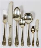 Lot# 1117 R. WALLACE & SONS 'VERSAILLES' STERLING FLATWARE, 75 PIECES-SERVICE FOR TWELVE, Sterling silver service includes 12 place knives, L.9 3/4", 12 place forks, L.7 1/2", 12 teaspoons, 12 gilt wash demi tasse spoons, 12 soup spoons, 12 butter spreaders, as well as 3 serving spoons, L.8"; each piece is engraved with "R" initial. Totaling approximately 71.33 troy oz. weighable.