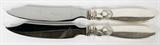 Lot# 1129 GEORG JENSEN 'CACTUS' STERLING FISH KNIVES, TWO, L 8", Each having a stainless blade and sterling silver handle is stamped "GI" in a beaded oval and "Sterling Denmark". From the Estate of Walter Connolly, Grosse Pointe Farms, Mi.