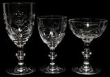 Lot# 1133 HAWKES 'SURREY' CRYSTAL STEMWARE, 29 PIECES, Including 10 water goblets, H.6 3/4", 9 wine glasses, H.5 1/4", and 10 champagnes/tall sherbets, H.5"; cut leaf motif and notched stem. Acid-etched stamped signature. From the Collection of John P. O'Hara, Bloomfield Hills, Mich.