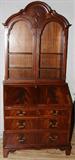 Lot# 1154 GEORGIAN STYLE MAHOGANY SECRETARY/BOOKCASE, H 84", W 36", D. 20" . Slant front opens to drop down desk. Lower drawers. Bookcase top. Circa 1930.