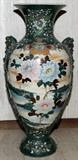 Lot# 1167 JAPANESE POTTERY URN, C. 1900, H 32", DIA 15", Baluster-form with dark green ground, large painted flowers and foo dog handles. From the Collection of John P. O'Hara, Bloomfield Hills, Mich.