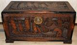 Lot# 1184 CHINESE CARVED TRUNK, H 24", W 42", D 22", Motif sailing vessels on the front panel, side panels are carved; hinged lid, circa 1940. From the Collection of John P. O'Hara, Bloomfield Hills, Mich.
