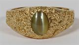 Lot# 1194 2.06CT NATURAL CATS EYE NUGGET RING, 10 3/4, chrysoberyl. 14kt yellow gold. 9.1 grams.