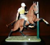 Lot# 1238 BOEHM BISQUE FIGURE OF A POLO PLAYER ON HORSE, H 13 1/2", L 12 1/2", With base. 2 1/2".
