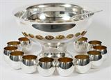 Lot# 1295 MERIDEN SILVERPLATE PUNCH BOWL WITH LADLE & CUPS (12), Including 1 punch bowl, not marked, H.9", Dia.14 1/4", 1 Victor Co. punch ladle, L.12 3/4", and a set of 12 cups by Meriden. Fourteen pieces total.